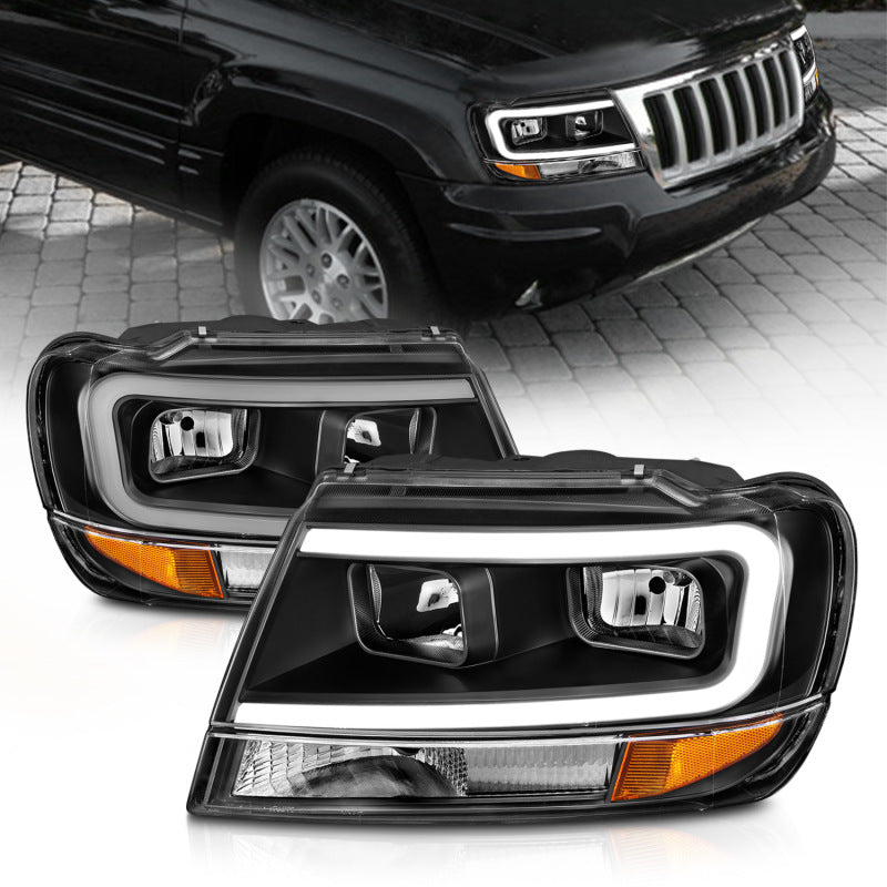 ANZO Crystal Headlights for 1999-2004 Jeep Grand Cherokee with black housing and clear lens, showcasing modern design and enhanced visibility.