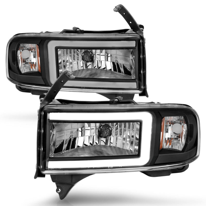 ANZO 94-02 Dodge RAM Crystal Headlight with black housing and integrated light bar, showcasing modern design and enhanced visibility.