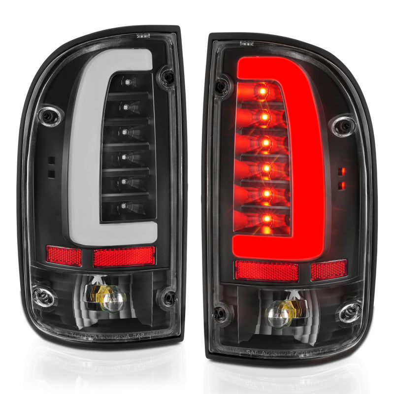 ANZO LED taillights for 95-00 Toyota Tacoma featuring black housing and clear lens, enhancing vehicle visibility and style.