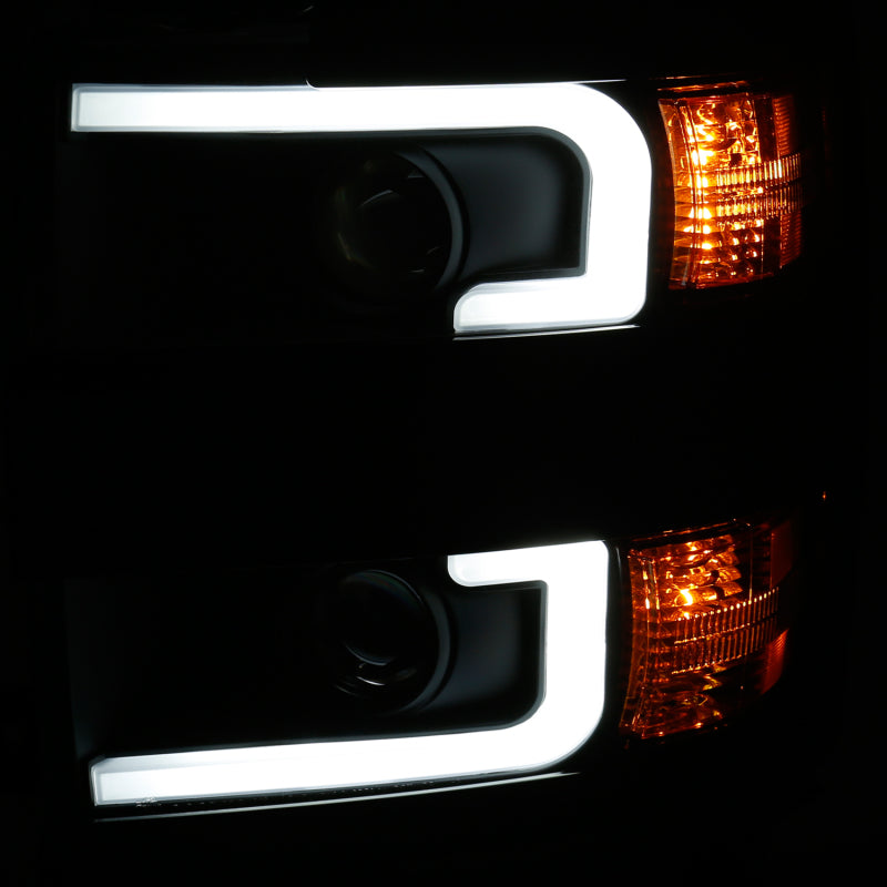 ANZO Projector Headlights with plank style design in black and amber for Chevrolet Silverado 2500 HD and 3500 HD models.