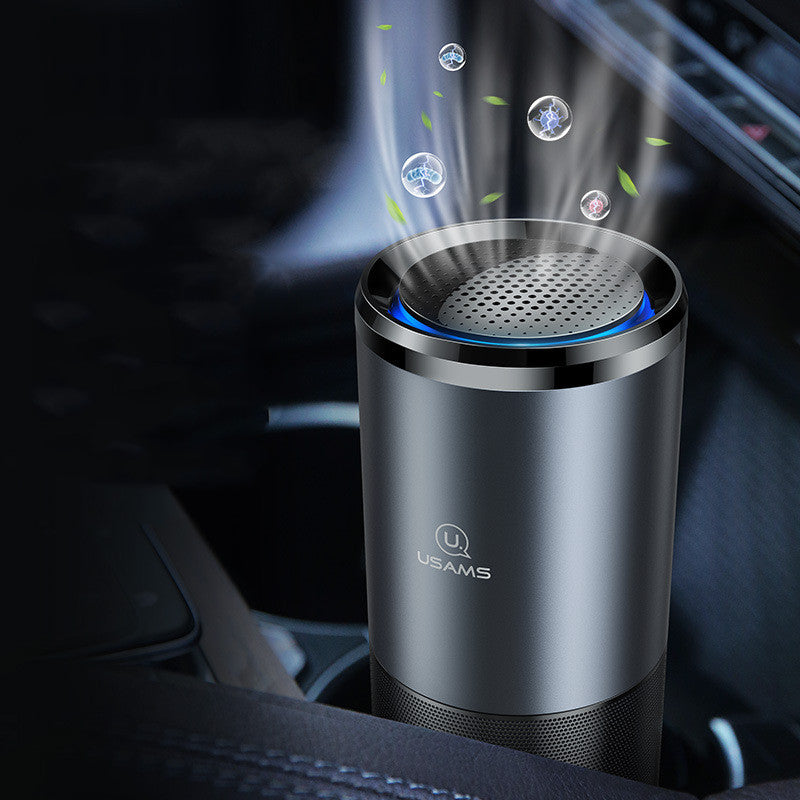 Portable air purifier in car.