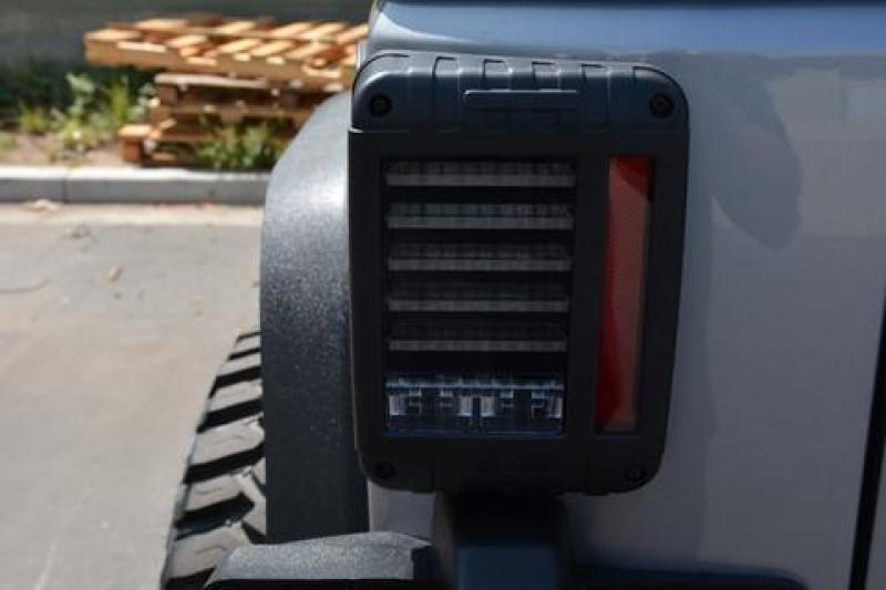 DV8 Offroad Horizontal LED Tail Light for Jeep Wrangler JK, showcasing its sleek design and bright LED features.