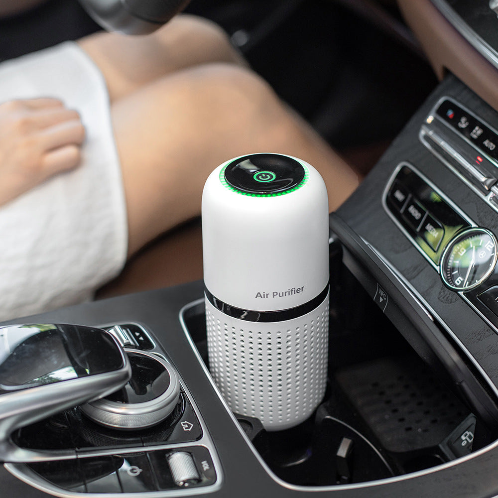 New P02 Car Air Purifier in a sleek design, showcasing its compact size and modern features for effective air purification.