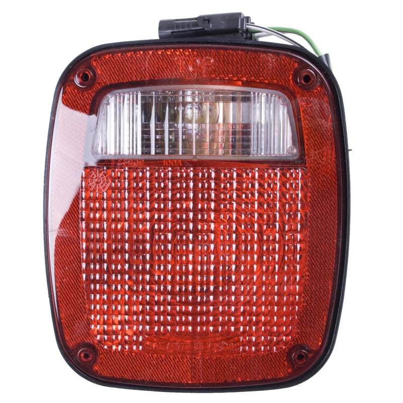 Omix Left Black Tail Lamp for 91-97 Jeep YJ TJ Wrangler, showcasing its sleek design and durable construction.