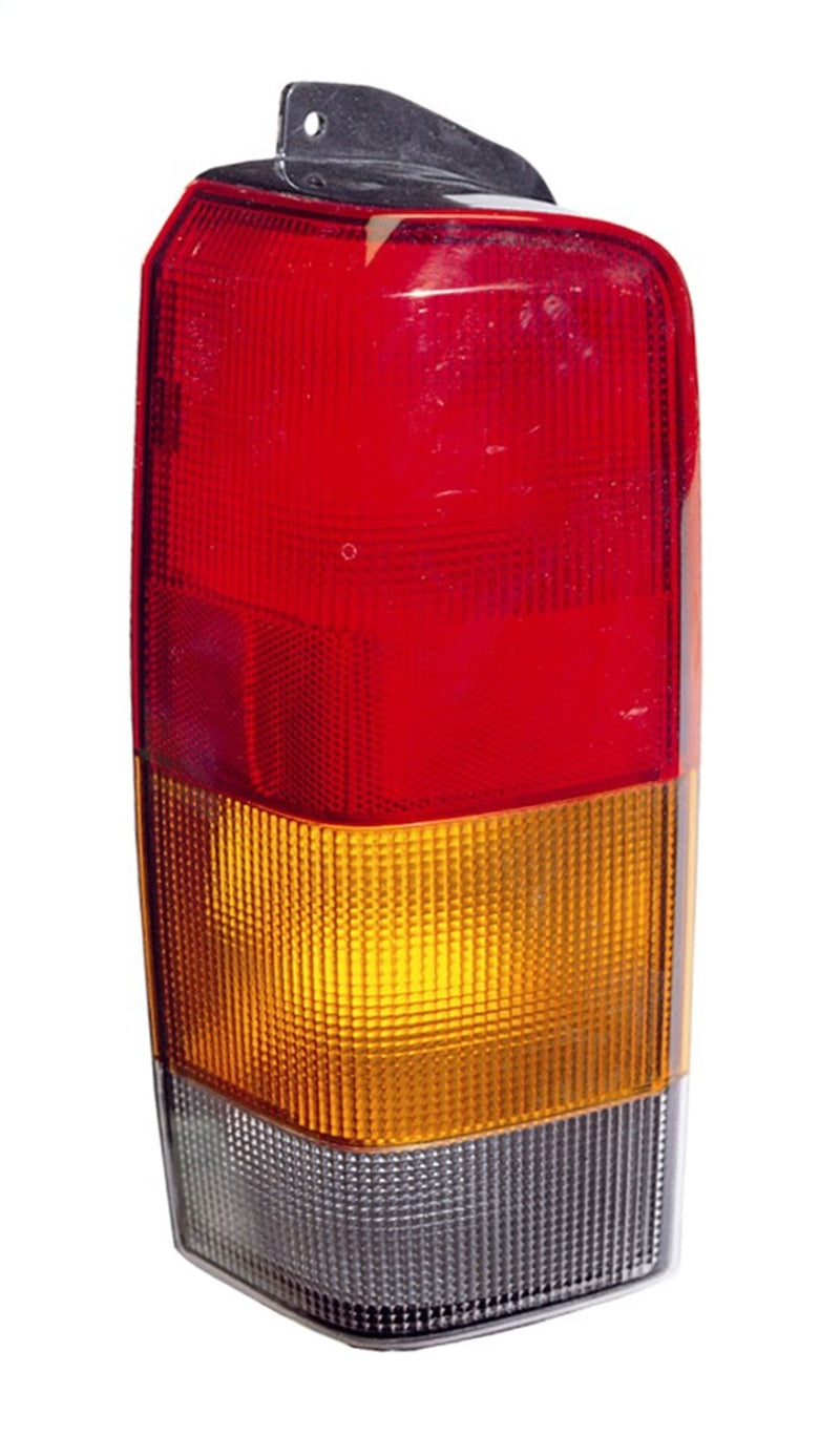 Omix Left Tail Lamp for 97-01 Jeep Cherokee, showcasing its clear lens and durable design.