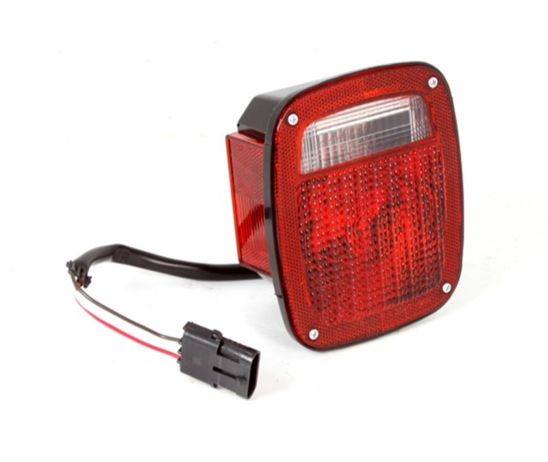 Omix Tail Light Black Housing LH for 87-90 Jeep Wrangler, showcasing its sleek design and durable construction.