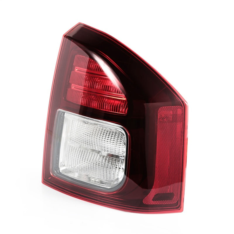 Omix Right Tail Light assembly for 2014-2017 Jeep Compass and Patriot models, showcasing its sleek design and quality construction.