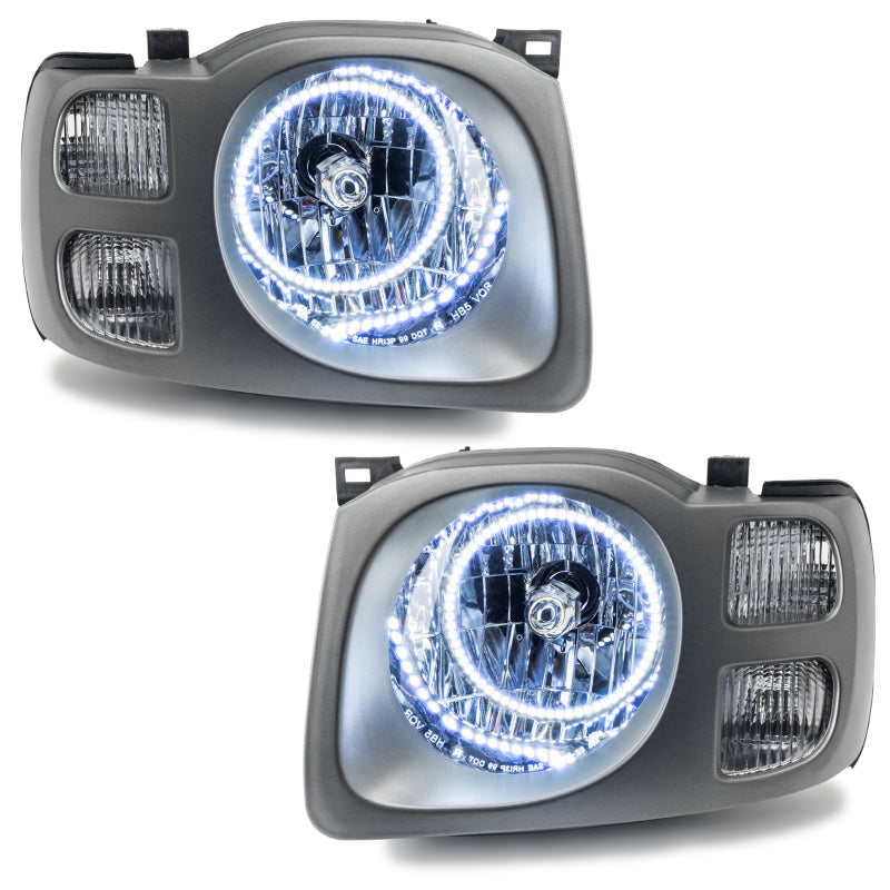 Oracle pre-assembled white headlights for 2002-2004 Nissan Xterra SE with halo rings installed.