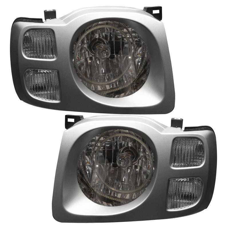 Oracle pre-assembled white headlights for 2002-2004 Nissan Xterra SE with halo rings installed.