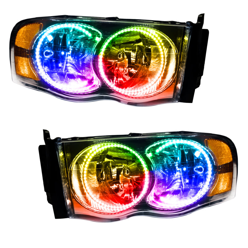 Oracle 02-05 Dodge Ram SMD headlights with ColorSHIFT halo rings and 2.0 controller, showcasing chrome and black housing options.