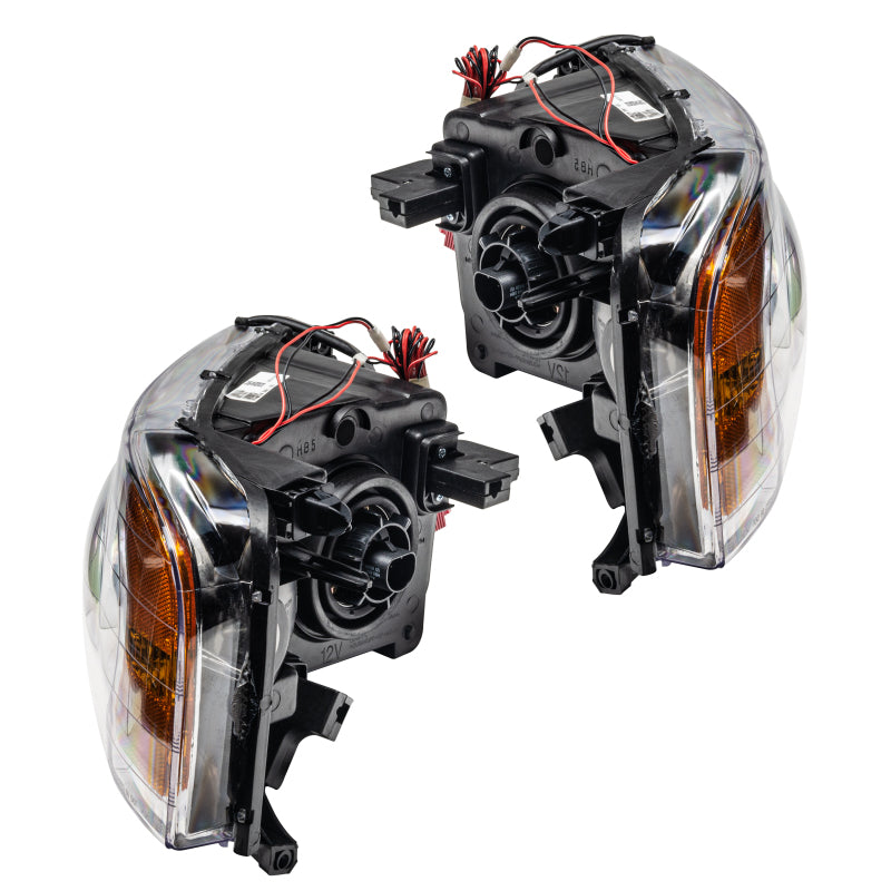 Oracle 02-05 Dodge Ram SMD headlights with ColorSHIFT halo rings and 2.0 controller, showcasing chrome and black housing options.