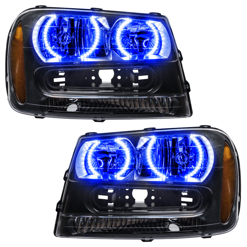 Oracle 02-09 Chevrolet Trail Blazer SMD HL - Blue headlights with halo rings installed, showcasing Chrome or Black housing options.