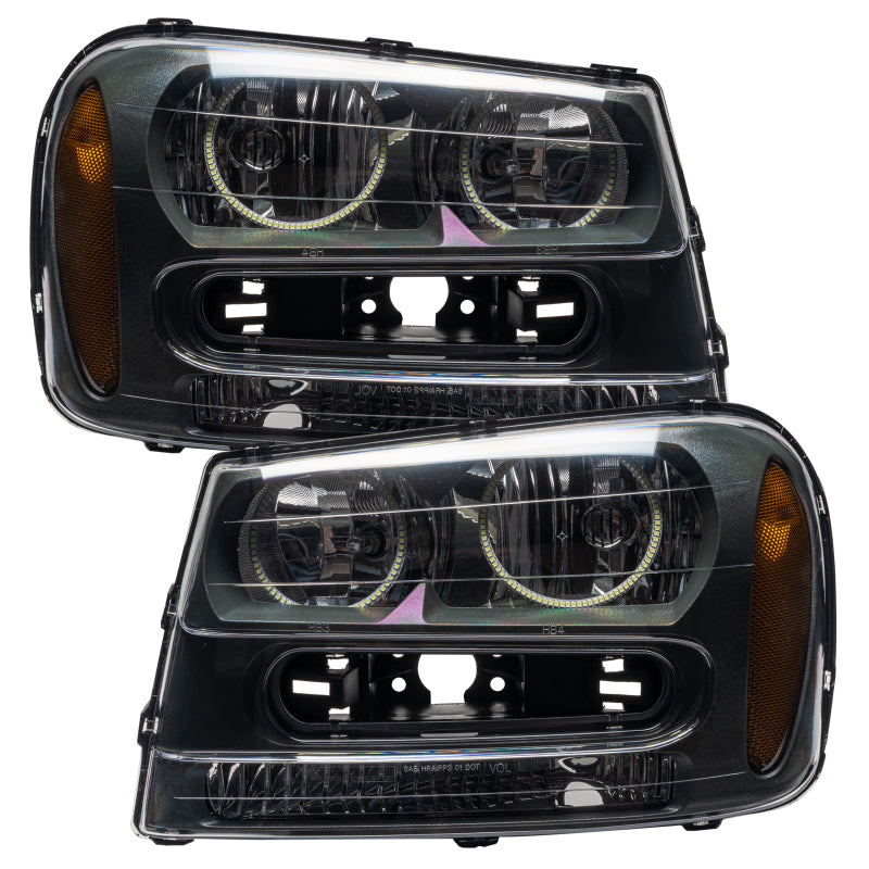 Oracle 02-09 Chevrolet Trail Blazer SMD headlights in red with halo rings, showcasing pre-assembled design and chrome housing.