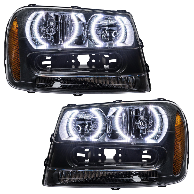 Oracle 02-09 Chevrolet Trail Blazer SMD HL - White headlights with halo rings, showcasing chrome and black housing options.