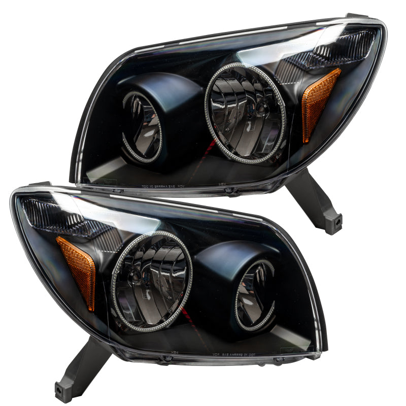 Oracle 03-05 Toyota 4-Runner SMD headlights in black with ColorSHIFT halo rings, showcasing a modern design and bright illumination.