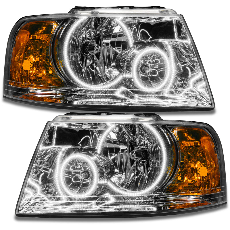 Oracle 03-06 Ford Expedition SMD Headlights with chrome housing and white halo rings, showcasing their sleek design and bright illumination.