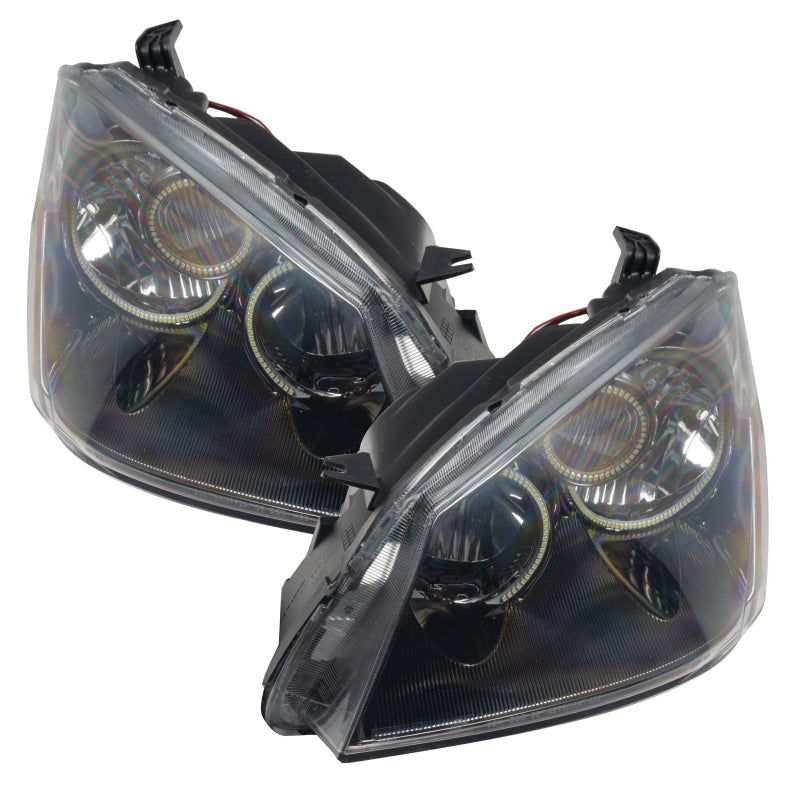 Oracle 05-06 Nissan Altima SMD headlights with white halo rings, showcasing chrome housing and professional installation.