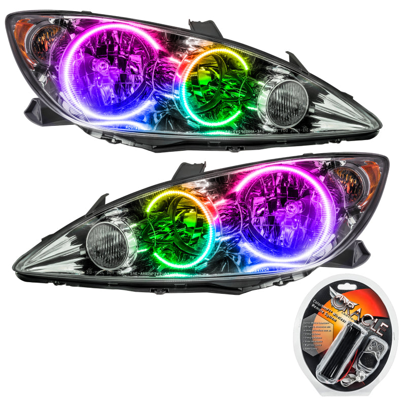 Oracle 05-06 Toyota Camry SMD HL ColorSHIFT headlights with halo rings installed in chrome and black housing.