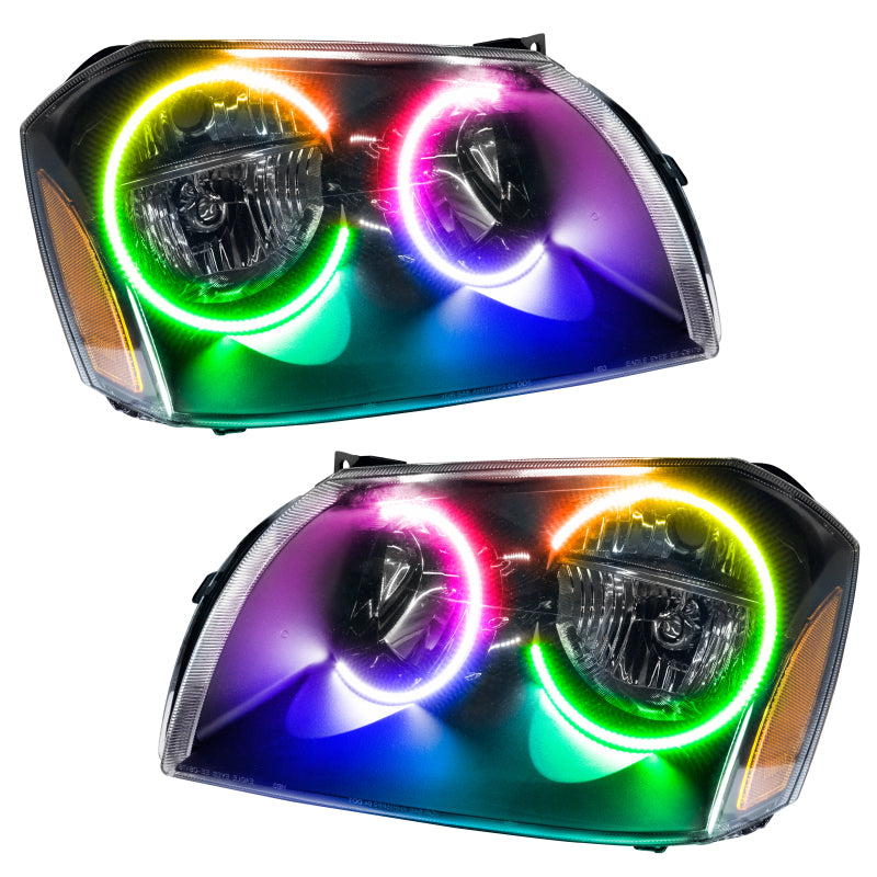 Oracle 05-07 Dodge Magnum SMD Headlights in Black with ColorSHIFT technology, showcasing professional halo installation.