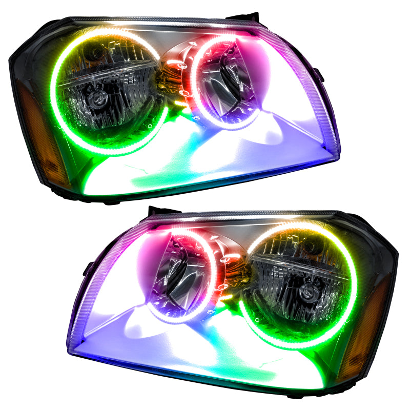 Oracle 05-07 Dodge Magnum SMD headlights with chrome housing and ColorSHIFT halo rings, showcasing a modern and stylish design.