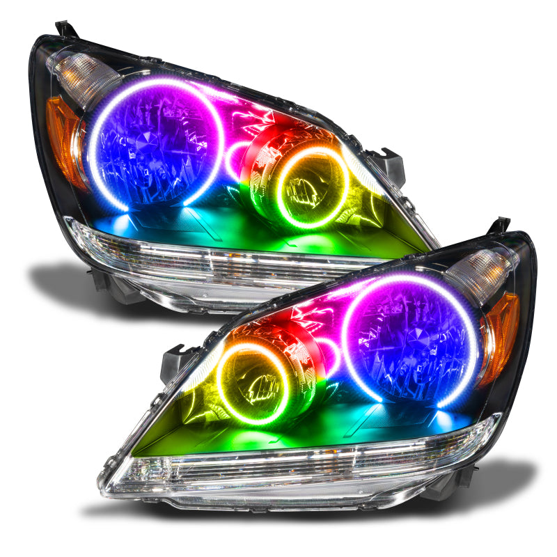 Oracle 05-07 Honda Odyssey SMD headlights with ColorSHIFT halo rings in Chrome and Black housing.