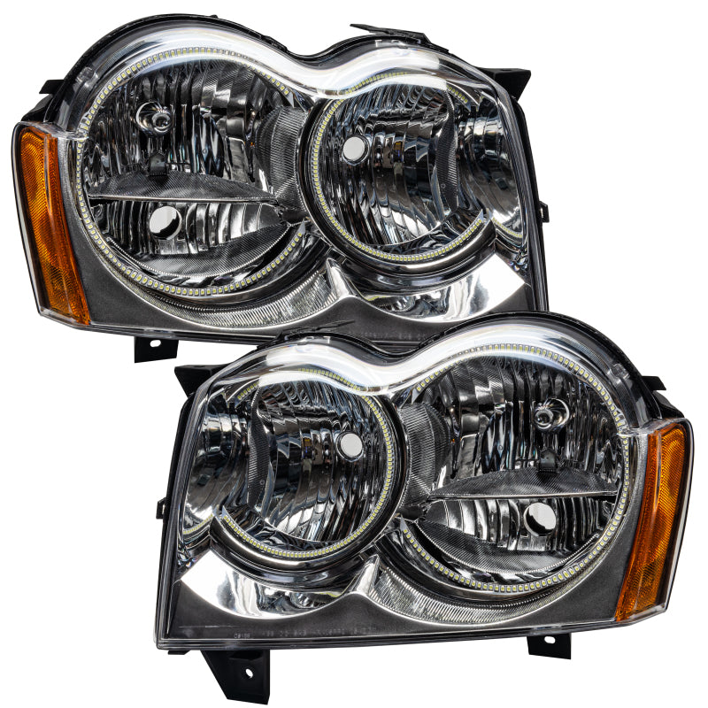 Oracle 05-07 Jeep Grand Cherokee SMD HL headlights with white halo rings, showcasing chrome and black housing options.