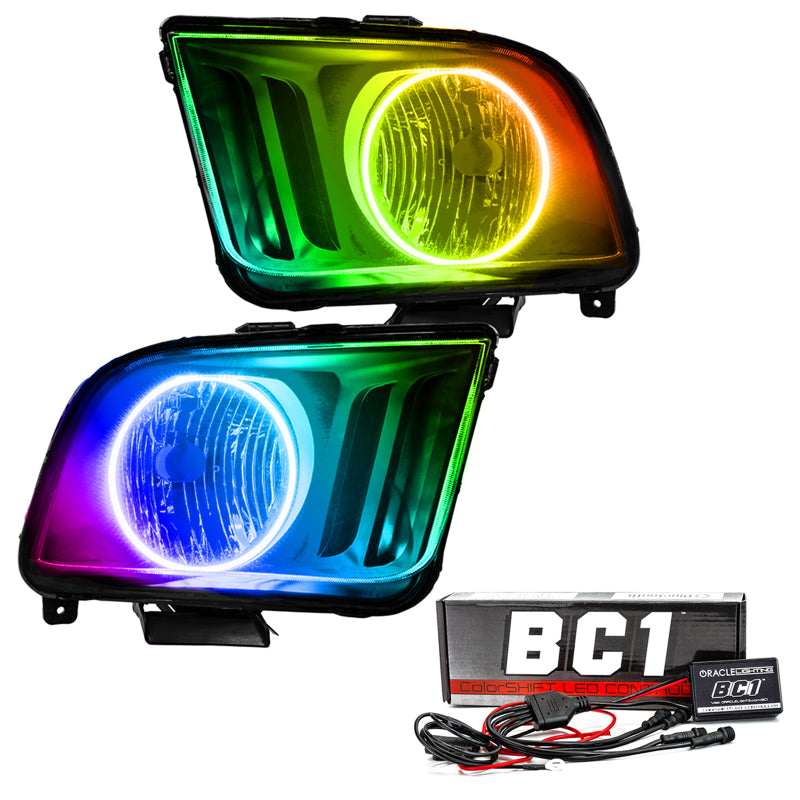 Oracle 05-09 Ford Mustang SMD headlights with ColorSHIFT technology and BC1 Controller, showcasing vibrant LED lighting.