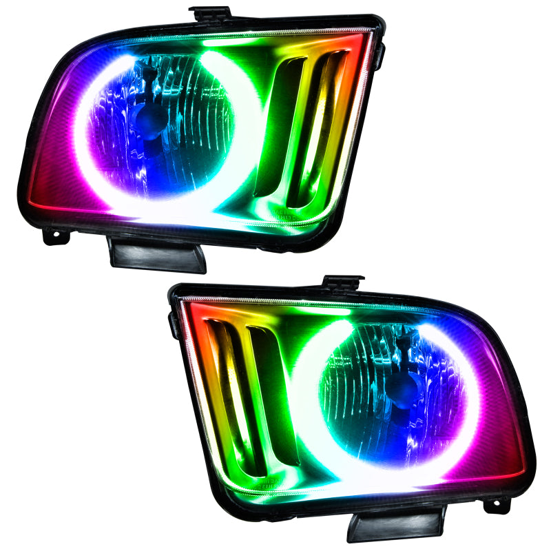 Oracle 05-09 Ford Mustang SMD headlights with ColorSHIFT technology and RF controller, showcasing chrome and black housing options.