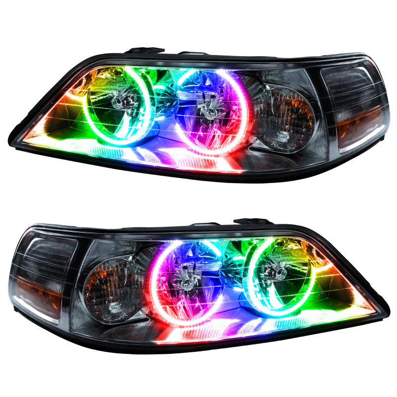 Oracle 05-11 Lincoln TownCar SMD headlights with ColorSHIFT halo rings in Chrome housing, showcasing modern automotive lighting design.