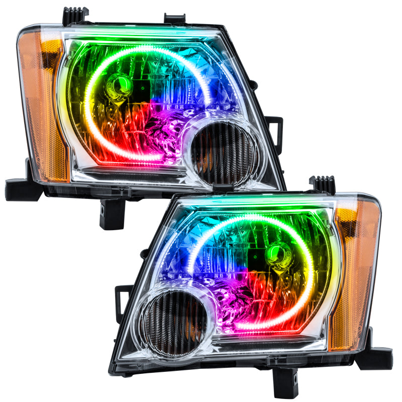 Oracle 05-14 Nissan Xterra SMD headlights with ColorSHIFT halo rings in Chrome housing, showcasing modern automotive lighting design.