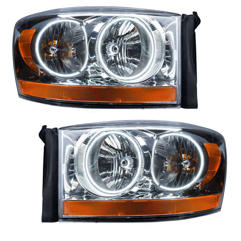 Oracle 06 Dodge Ram SMD HL - White headlights with halo rings, showcasing Chrome and Black housing options.