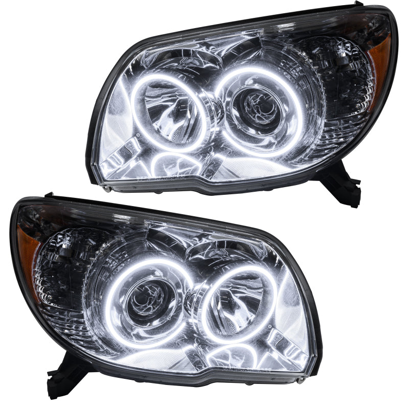 Oracle pre-assembled white headlights for 2006-2009 Toyota 4Runner with halo rings installed, showcasing chrome and black housing options.