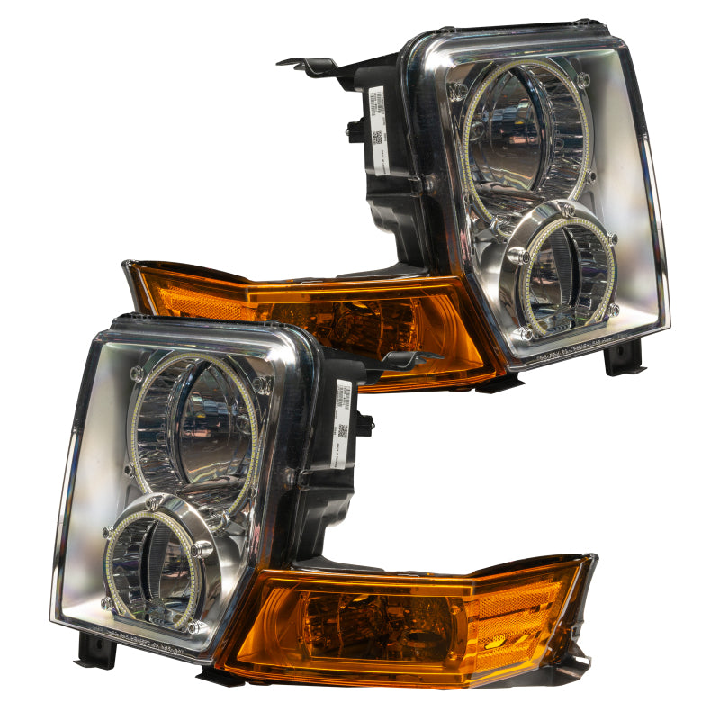 Oracle 06-10 Jeep Commander SMD headlights with ColorSHIFT halo rings, showcasing chrome and black housing options.