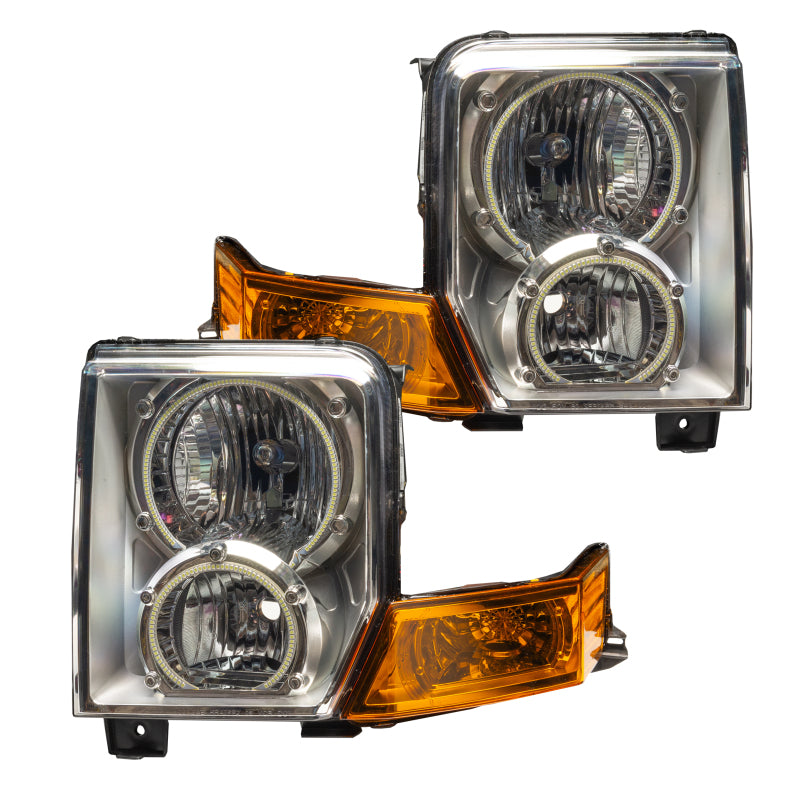 Oracle 06-10 Jeep Commander SMD headlights with ColorSHIFT halo rings, showcasing chrome and black housing options.