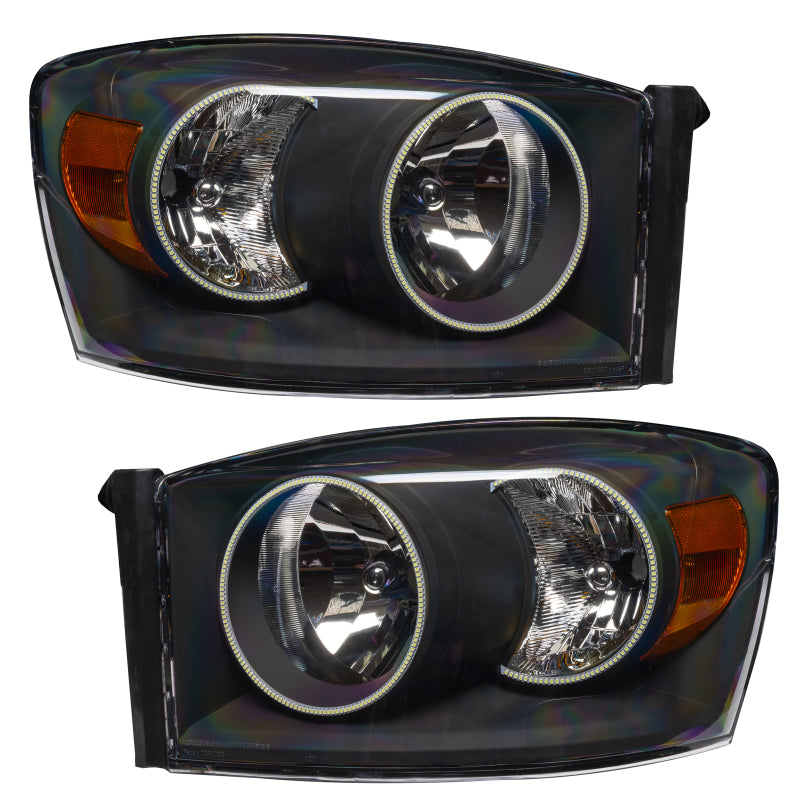 Oracle 07-08 Dodge Ram SMD headlights in black with ColorSHIFT halo rings and 2.0 controller, showcasing modern automotive lighting technology.