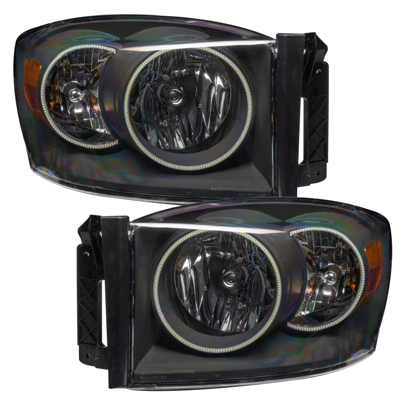 Oracle 07-08 Dodge Ram SMD headlights in black with ColorSHIFT halo rings and 2.0 controller, showcasing modern automotive lighting technology.