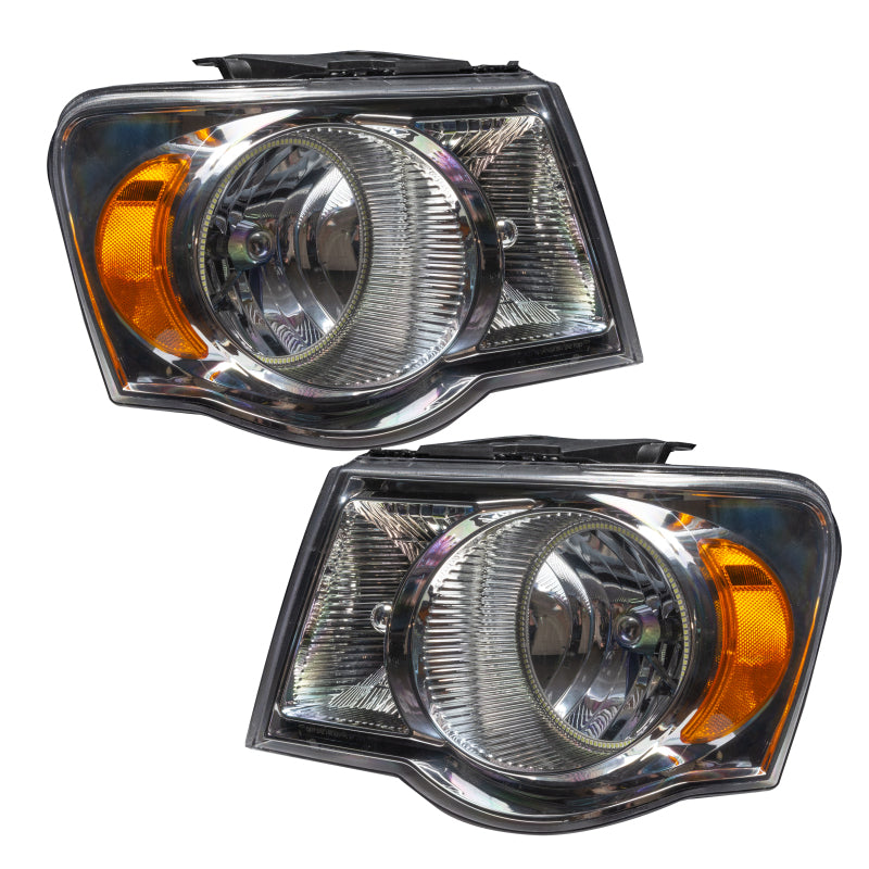 ORACLE 07-09 Dodge Durango SMD headlights with chrome housing and white halo rings, showcasing a modern design.