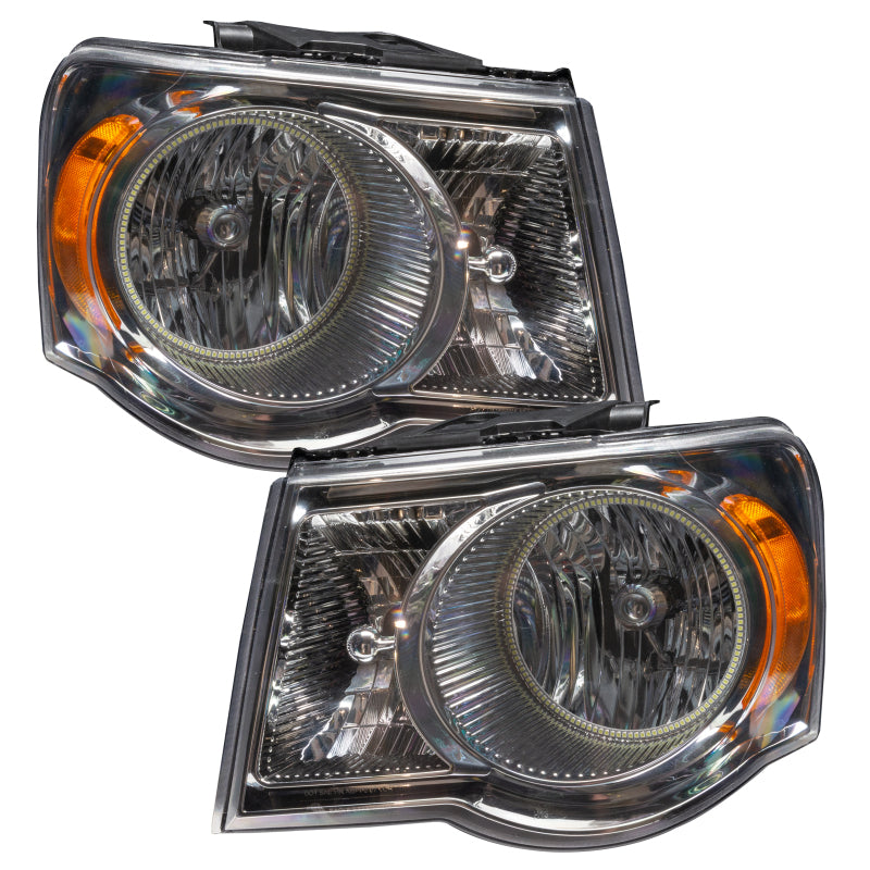 ORACLE 07-09 Dodge Durango SMD headlights with chrome housing and white halo rings, showcasing a modern design.