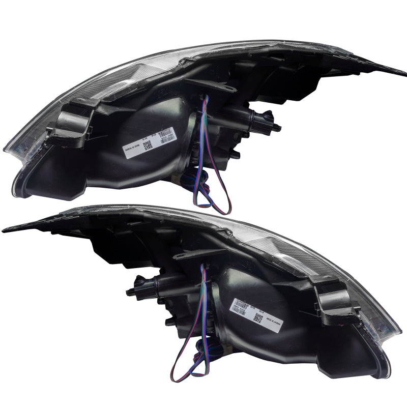 Black ORACLE Pre-Assembled Headlights for 2007-2009 Nissan Altima with ColorSHIFT technology, showcasing halo rings and sleek design.