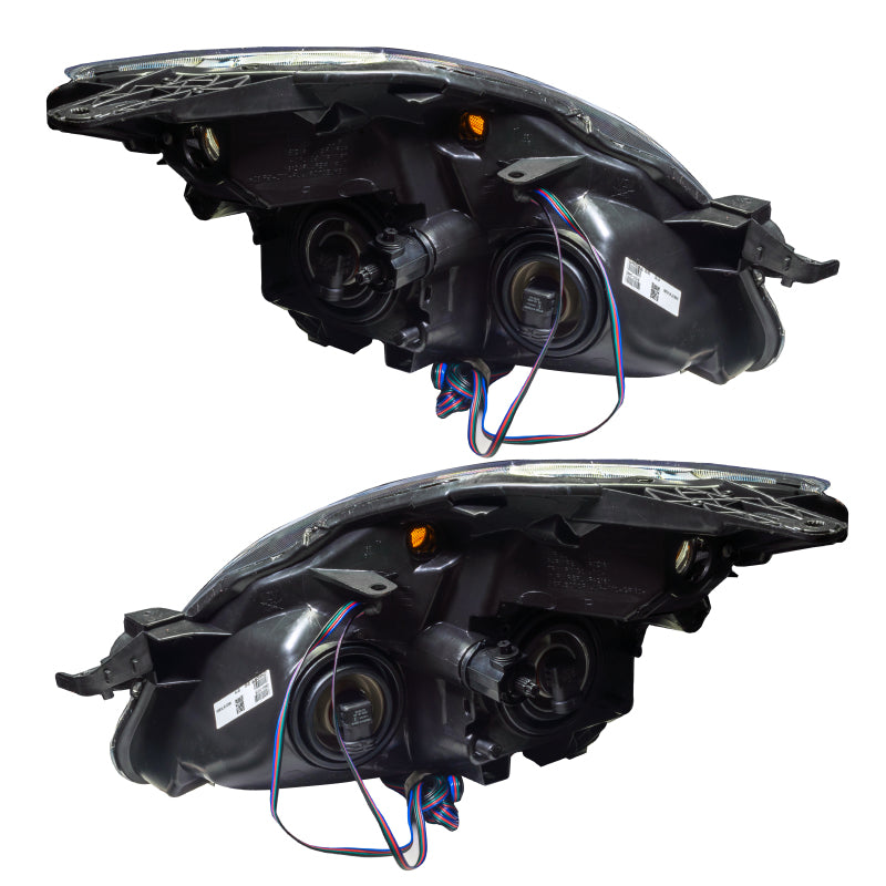 Black ORACLE Pre-Assembled Headlights for 2007-2009 Nissan Altima with ColorSHIFT technology, showcasing halo rings and sleek design.