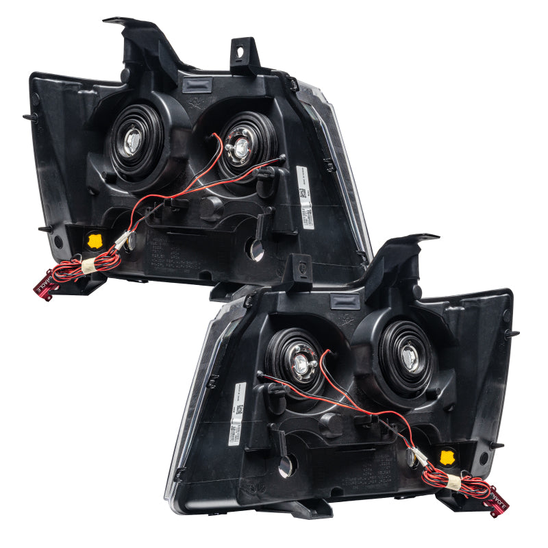 Oracle Pre-Assembled SMD Headlights for Chevrolet Avalanche, featuring Chrome and Black housing with installed halo rings.