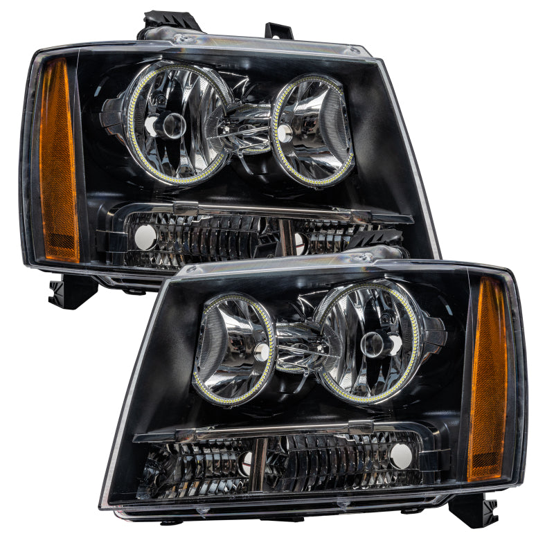 Oracle Pre-Assembled SMD Headlights for Chevrolet Avalanche, featuring Chrome and Black housing with installed halo rings.