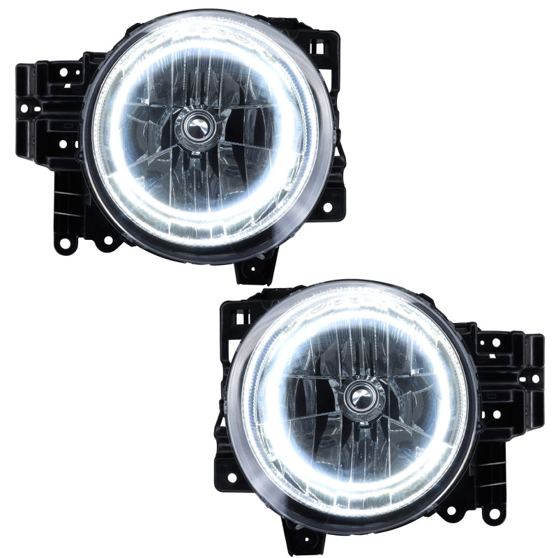 Oracle 07-14 Toyota FJ Cruiser SMD headlights with white halo rings, showcasing chrome and black housing options.