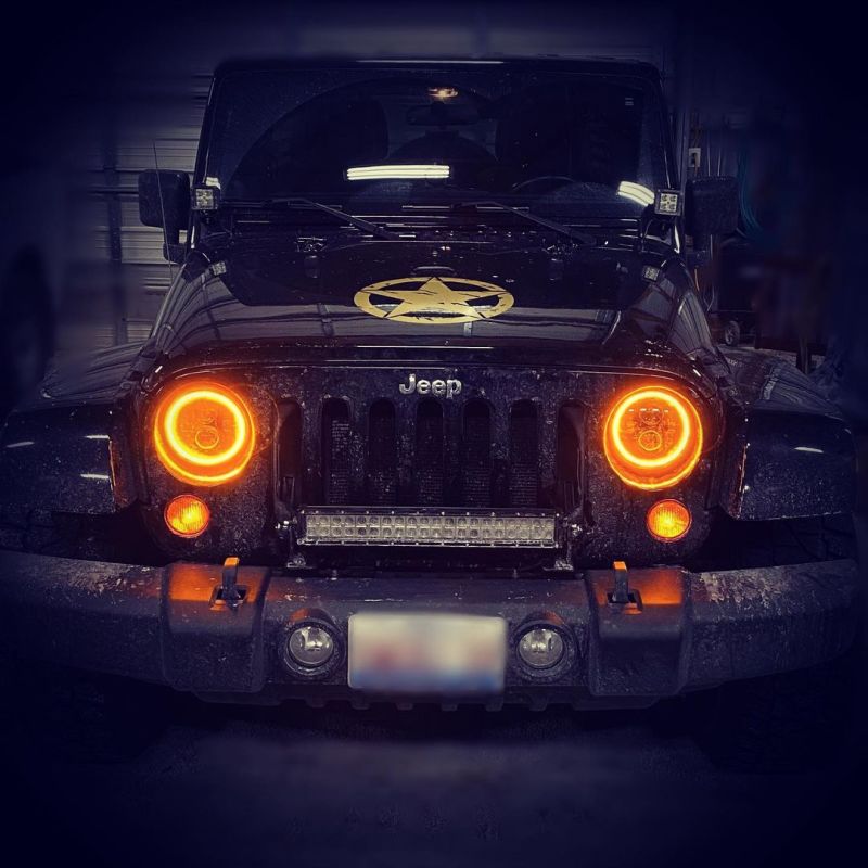 Oracle 07-18 Jeep Wrangler JK Switchback LED Halo Headlights with integrated amber turn signal, showcasing advanced LED technology and sleek design.