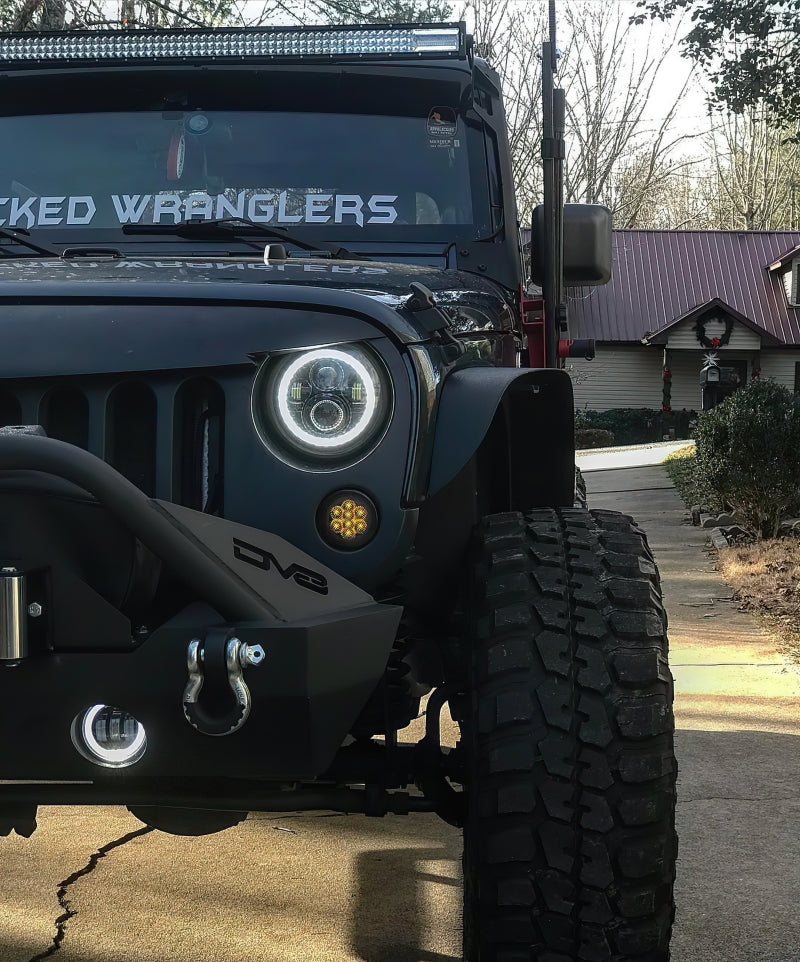 Oracle 07-18 Jeep Wrangler JK Switchback LED Halo Headlights with integrated amber turn signal, showcasing advanced LED technology and sleek design.