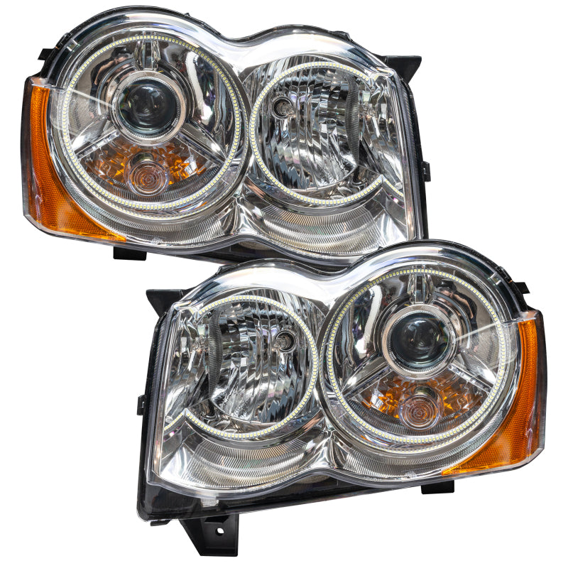 Oracle 08-10 Jeep Grand Cherokee SMD HL - HID headlights with white halo rings, showcasing Chrome and Black housing options.