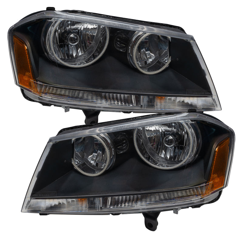 Oracle 08-14 Dodge Avenger RT SMD headlights in black housing with white halo rings, showcasing a modern and stylish design.