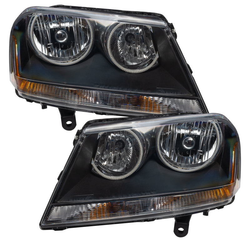 Oracle 08-14 Dodge Avenger RT SMD headlights in black housing with white halo rings, showcasing a modern and stylish design.