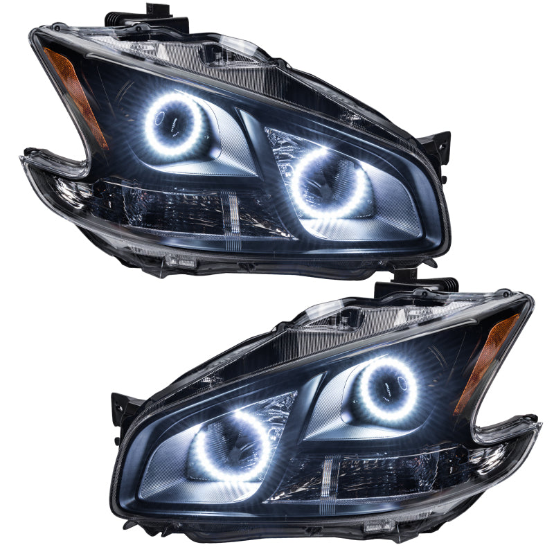 Oracle 09-13 Nissan Maxima SMD headlights with chrome housing and white halo rings, showcasing a modern design for enhanced visibility.