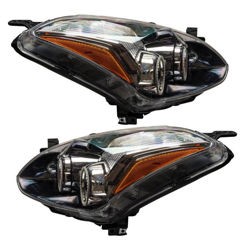 Oracle 10-12 Nissan Altima Coupe SMD headlights with ColorSHIFT halo rings and 2.0 controller, showcasing sleek design and bright illumination.